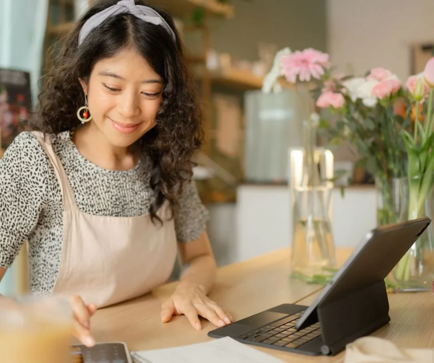 successful-self-employed-florist-working-at-flower-shop