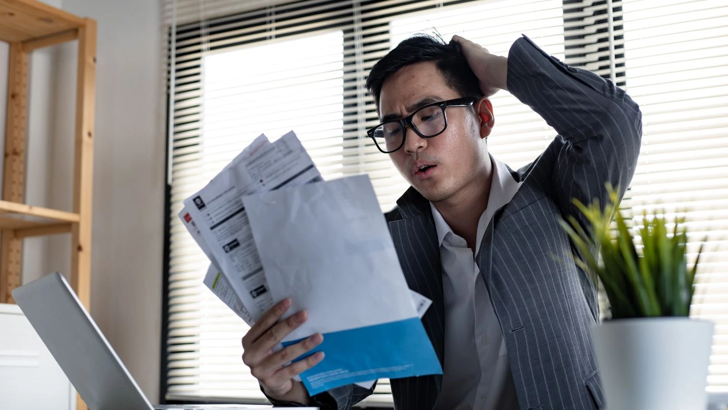 Asian Man Is Stressed And Overthink By Debt From Many Credit Cards And Bills