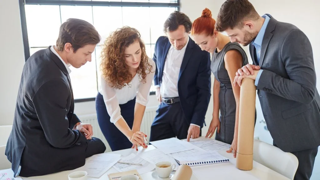 Business People Brainstorming And Planning 1024x577