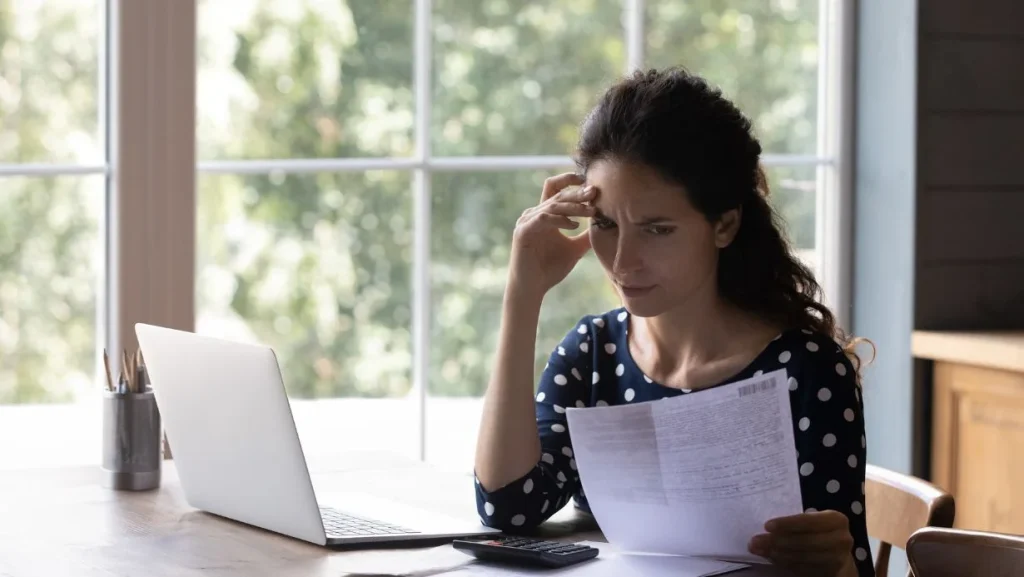 Concern Housewife Checking Utility Bill Seeing Mistaken Too High Costs 1024x577