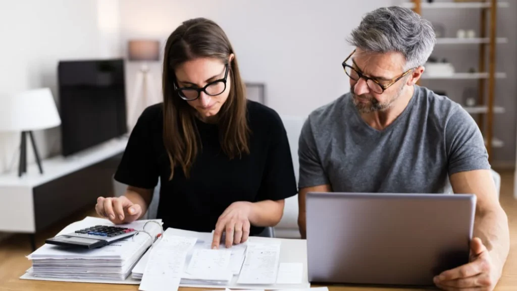 Couple Doing Taxes And Family Budget 1024x577