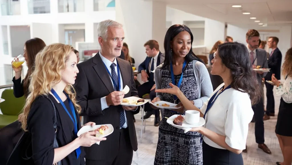 delegates networking during conference lunch break