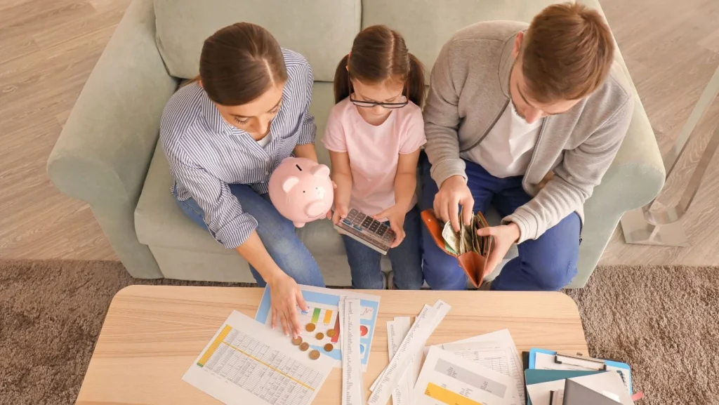 Family Counting Money Indoors Money Savings Concept