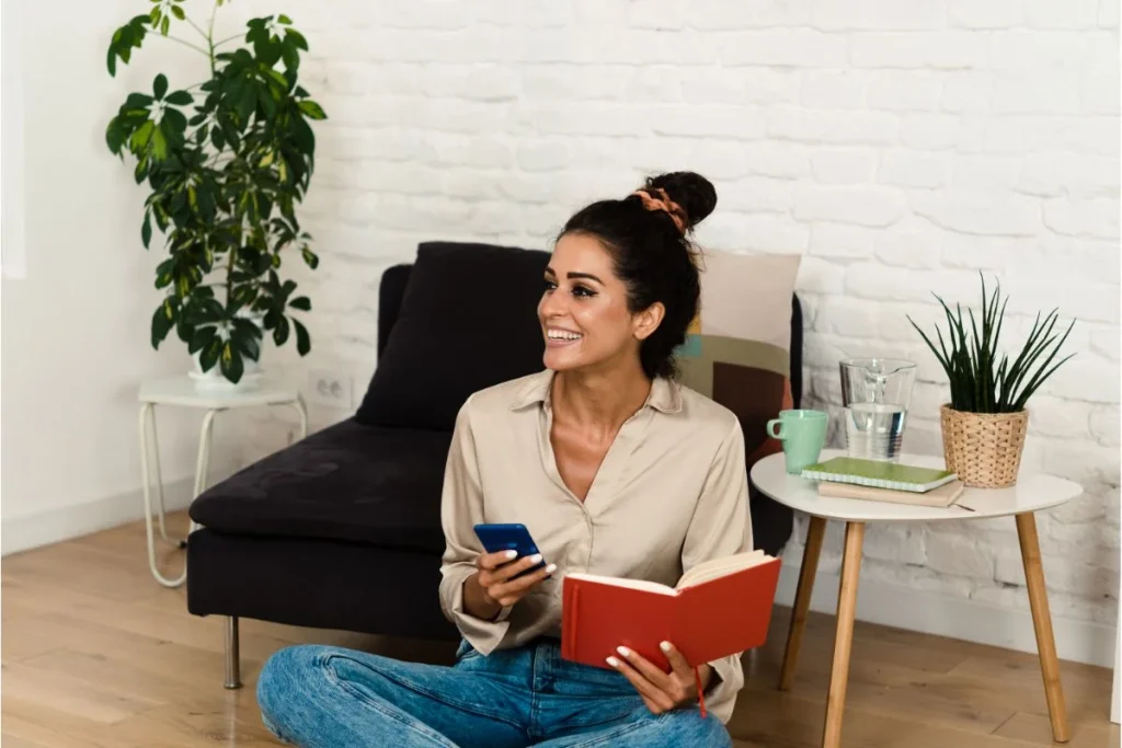 Portrait Of A Beautiful Woman Checking Her Monthly Income Using A Mobile App 1024x683