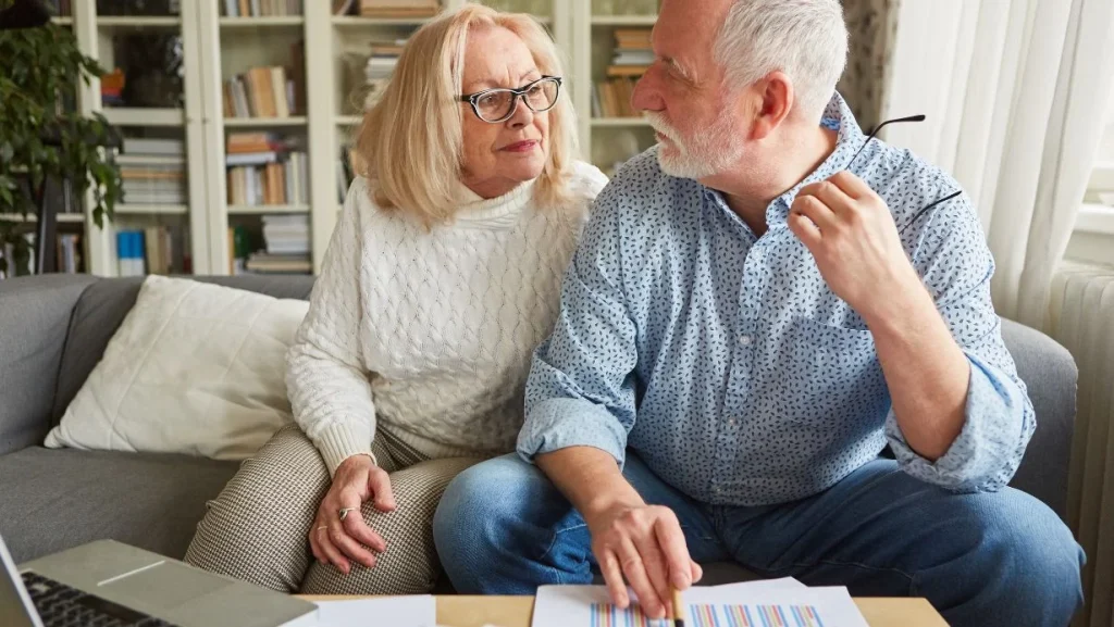 Retired Senior Couple Planning Retirement And Retirement 1024x577