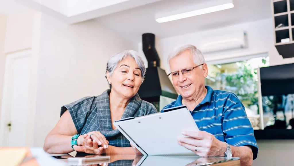 Senior Couple Planning Their Retirement 1024x577