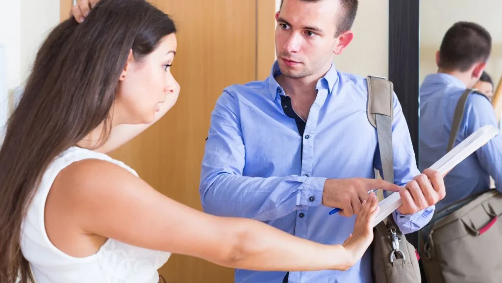 Woman And Man Having Argue With Documents 1024x577