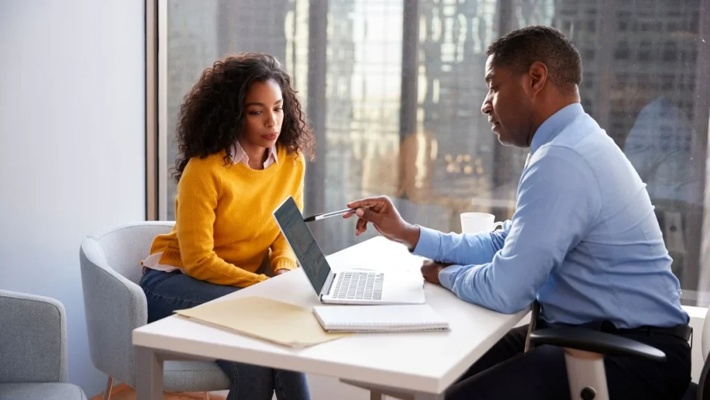 Woman Meeting With Male Financial Advisor Relationship Counsello 1024x577