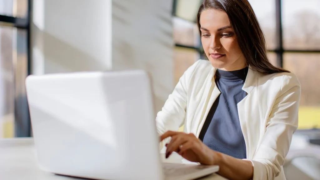 Young Woman Working On Computer 1024x577